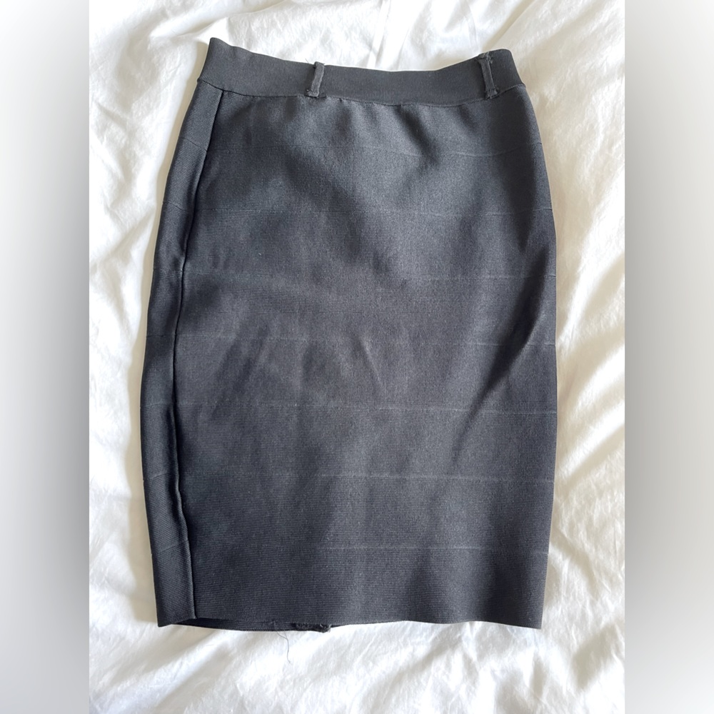 Black pencil skirt, size small, never worn, stretchy material